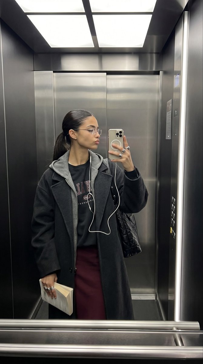 Elevator Mirror Selfie with Book 1