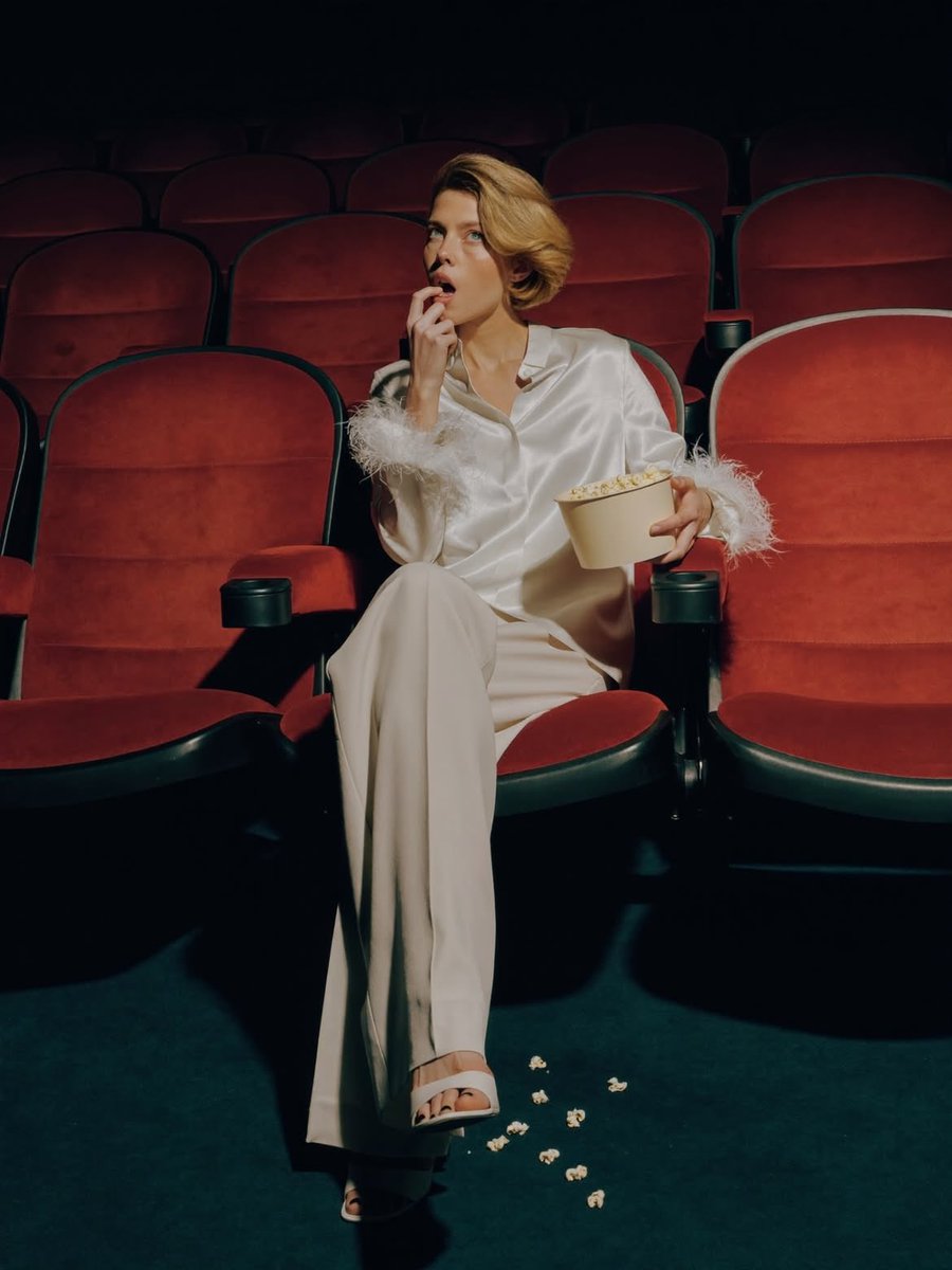 Elegant Fashion Editorial in a Dark Movie Theater 1