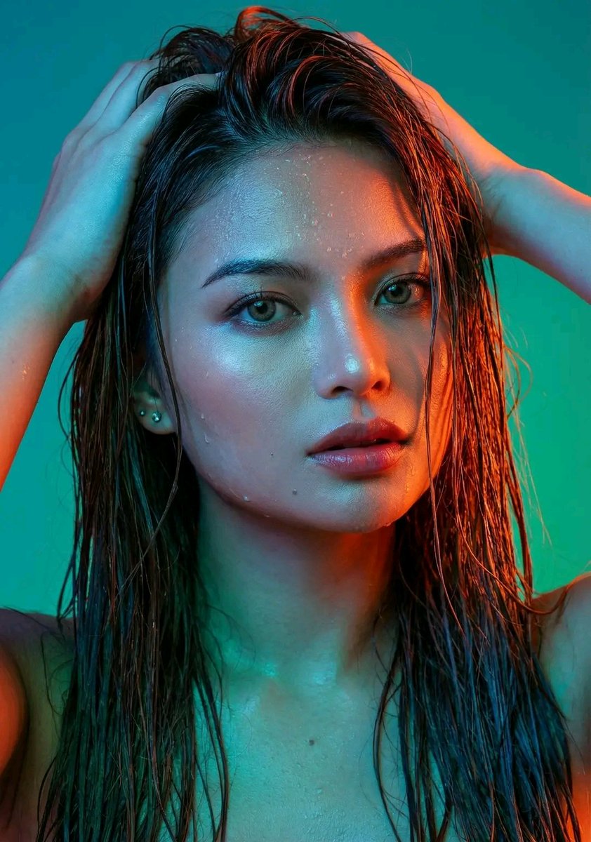 Dramatic Neon Portrait with Wet Hair and Color Contrast 3