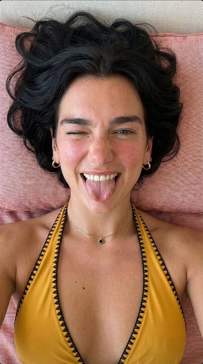 Playful Overhead Portrait with Winking Expression Prompt (Black Hair) 1