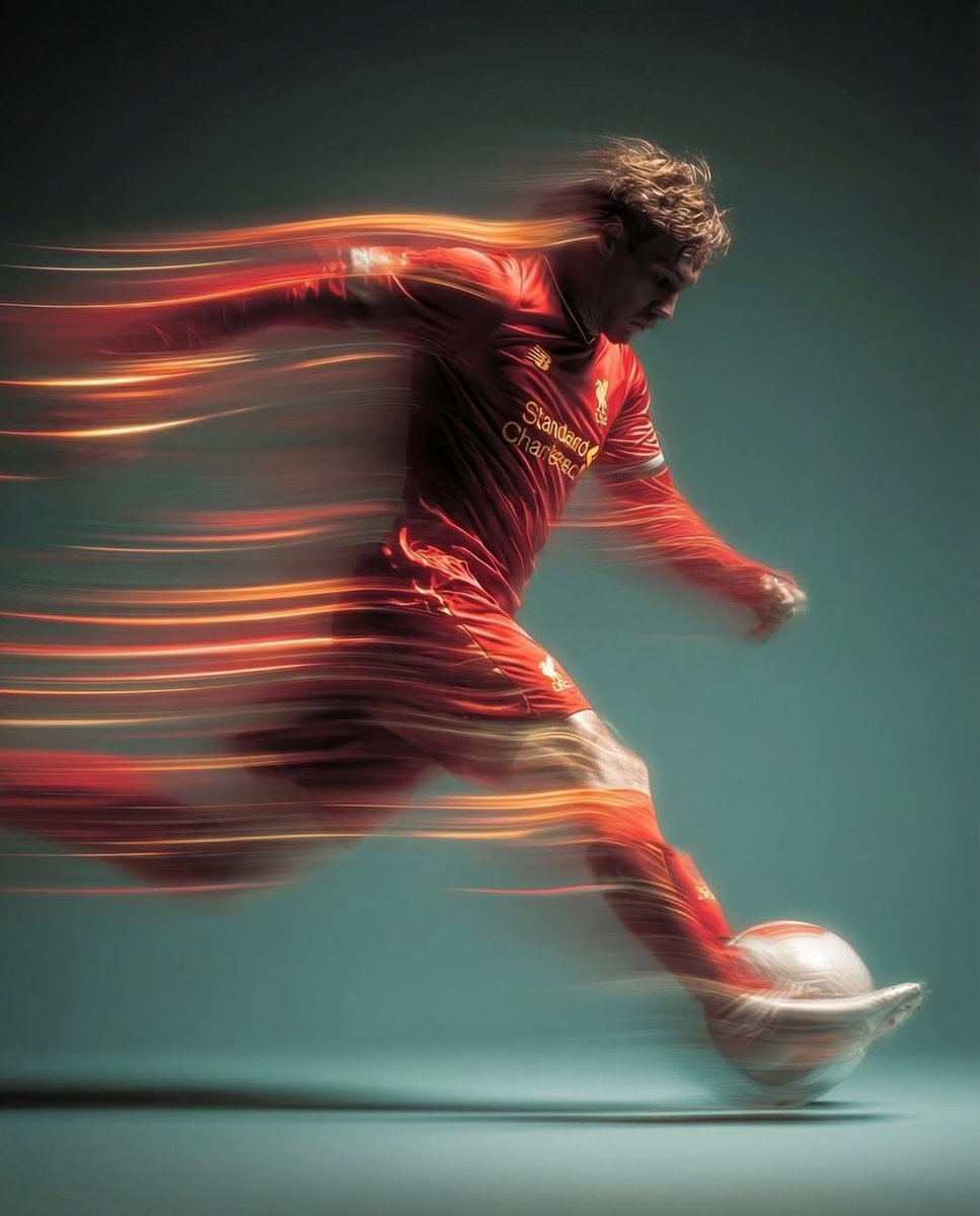 Panning shot of a soccer player kicking a ball