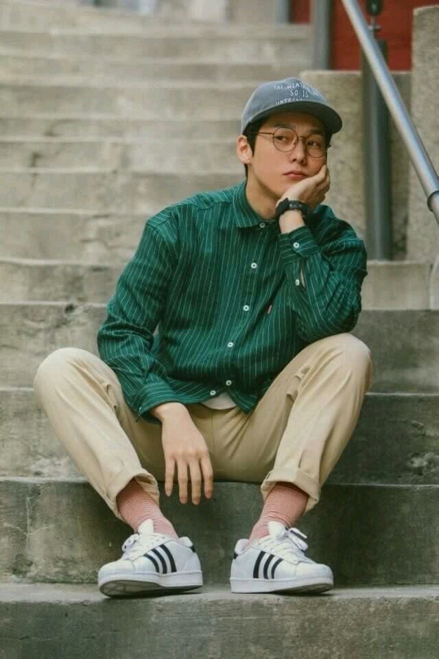 Introspective Young Man on Concrete Stairs 1