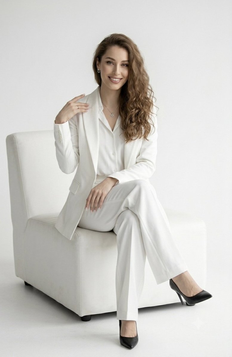 Elegant White Pantsuit Studio Portrait 2